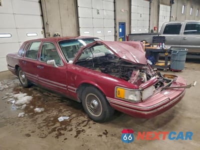 Czwarte zdjęcie samochodu z boku: 1991 LINCOLN TOWN CAR EXECUTIVE VIN:1LNCM81W8MY744354 - miniatura