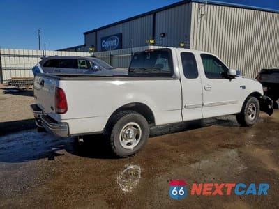 Trzecie zdjęcie samochodu z tyłu: 2002 FORD F150 VIN:1FTRX17WX2NB60749 - miniatura