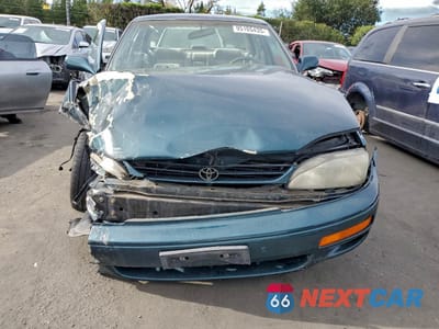 Piąte zdjęcie samochodu w środku: 1996 TOYOTA CAMRY DX VIN:4T1BG12K2TU713497 - miniatura