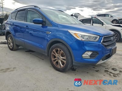 Czwarte zdjęcie samochodu z boku: 2018 FORD ESCAPE SEL VIN:1FMCU9HD9JUC99121 - miniatura