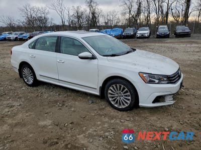Czwarte zdjęcie samochodu z boku: 2016 VOLKSWAGEN PASSAT SE VIN:1VWBT7A33GC061334 - miniatura