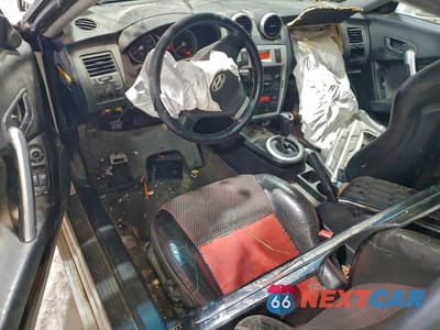 Zdjęcie 8 z 12 samochodu: 2006 HYUNDAI TIBURON GT VIN:KMHHN65F26U230821 - miniatura