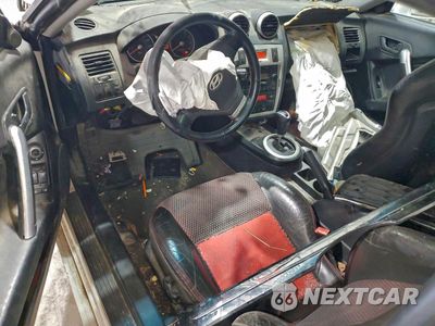 Zdjęcie 8 z 12 samochodu: 2006 HYUNDAI TIBURON GT VIN:KMHHN65F26U230821 - miniatura