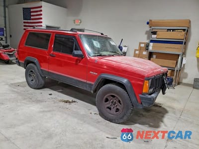 Czwarte zdjęcie samochodu z boku: 1995 JEEP CHEROKEE SPORT VIN:1J4FT67S2SL576986 - miniatura