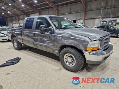 Czwarte zdjęcie samochodu z boku: 2003 FORD F250 SUPER DUTY VIN:1FTNW20F53EA98390 - miniatura