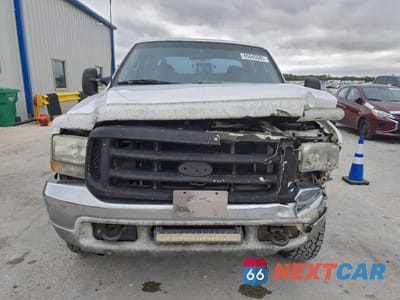 Piąte zdjęcie samochodu w środku: 2000 FORD F250 SUPER DUTY VIN:1FTNW20F0YED91461 - miniatura