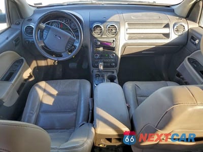 Zdjęcie 8 z 12 samochodu: 2008 FORD TAURUS X SEL VIN:1FMDK02WX8GA27833 - miniatura