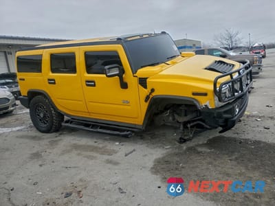 Czwarte zdjęcie samochodu z boku: 2003 HUMMER H2 VIN:5GRGN23U23H136418 - miniatura