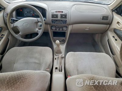 Zdjęcie 8 z 14 samochodu: 2000 TOYOTA COROLLA VE VIN:1NXBR12E7YZ412056 - miniatura