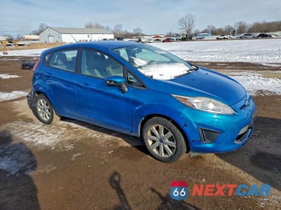 Czwarte zdjęcie samochodu z boku: 2013 FORD FIESTA SE VIN:3FADP4EJ8DM175949 - miniatura