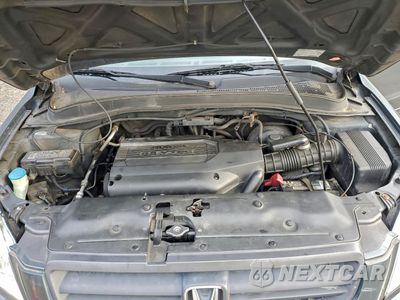Zdjęcie 11 z 14 samochodu: 2003 HONDA PILOT EXL VIN:2HKYF18653H593765 - miniatura