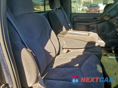 Zdjęcie 10 z 14 samochodu: 2000 GMC NEW SIERRA K1500 VIN:1GTEK14V8YZ295772 - miniatura