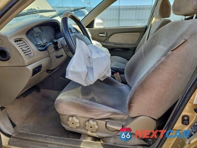 Zdjęcie 7 z 11 samochodu: 2002 HYUNDAI SONATA BASE VIN:KMHWF25S42A668777 - miniatura