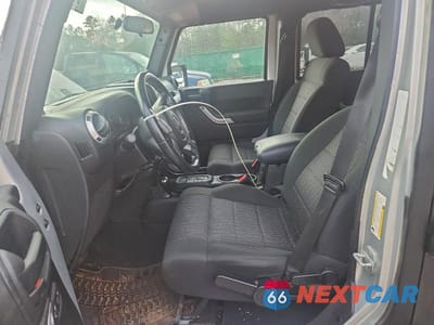 Zdjęcie 7 z 13 samochodu: 2012 JEEP WRANGLER UNLIMITED SAHARA VIN:1C4HJWEG8CL118230 - miniatura