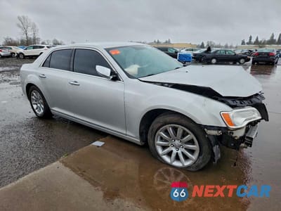 Czwarte zdjęcie samochodu z boku: 2012 CHRYSLER 300 LIMITED VIN:2C3CCACG4CH126675 - miniatura