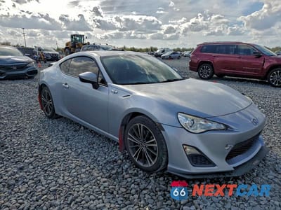 Czwarte zdjęcie samochodu z boku: 2015 SCION FR-S BASE VIN:JF1ZNAA10F8711655 - miniatura