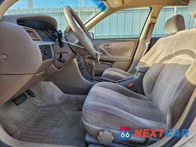 Zdjęcie 7 z 12 samochodu: 1997 TOYOTA CAMRY LE VIN:JT2BG22K0V0083864 - miniatura