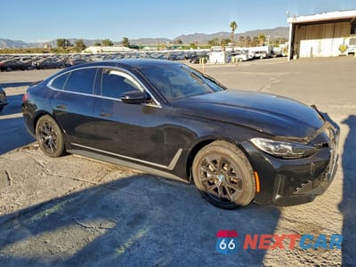 Czwarte zdjęcie samochodu z boku: 2024 BMW I4 EDRIVE 35 VIN:WBY43AW0XRFT38133 - miniatura