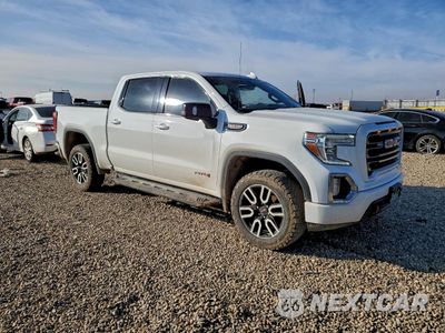 Czwarte zdjęcie samochodu z boku: 2021 GMC SIERRA K1500 AT4 VIN:3GTP9EEL2MG412703 - miniatura