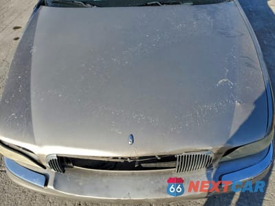 Zdjęcie 11 z 12 samochodu: 2000 BUICK PARK AVENUE VIN:1G4CW54K8Y4224007 - miniatura
