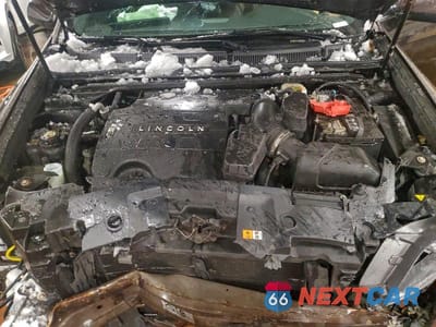 Zdjęcie 11 z 12 samochodu: 2014 LINCOLN MKS VIN:1LNHL9DK1EG600661 - miniatura