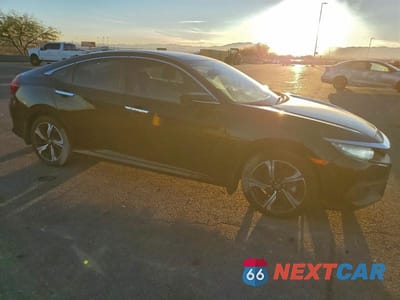 Czwarte zdjęcie samochodu z boku: 2016 HONDA CIVIC TOURING VIN:19XFC1F93GE027434 - miniatura