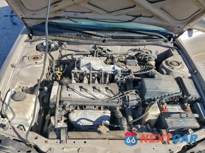 Zdjęcie 11 z 12 samochodu: 1995 TOYOTA COROLLA LE VIN:1NXAE09B0SZ305337 - miniatura