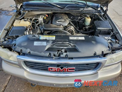 Zdjęcie 11 z 12 samochodu: 2001 GMC NEW SIERRA K1500 VIN:1GTEK19T51E177120 - miniatura