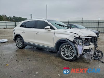 Czwarte zdjęcie samochodu z boku: 2017 LINCOLN MKX RESERVE VIN:2LMPJ6LR7HBL31628 - miniatura