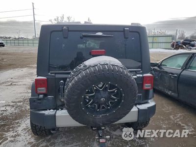 Zdjęcie 6 z 13 samochodu: 2012 JEEP WRANGLER UNLIMITED SAHARA VIN:1C4BJWEG0CL123900 - miniatura