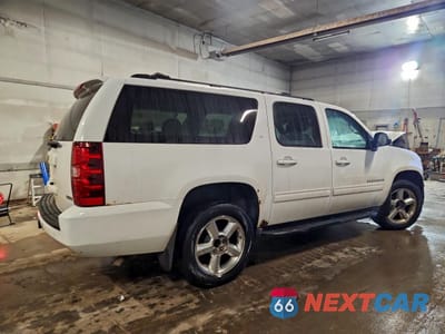 Trzecie zdjęcie samochodu z tyłu: 2012 CHEVROLET SUBURBAN K1500 LT VIN:1GNSKJE77CR215283 - miniatura
