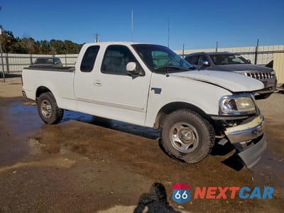 Czwarte zdjęcie samochodu z boku: 2002 FORD F150 VIN:1FTRX17WX2NB60749 - miniatura
