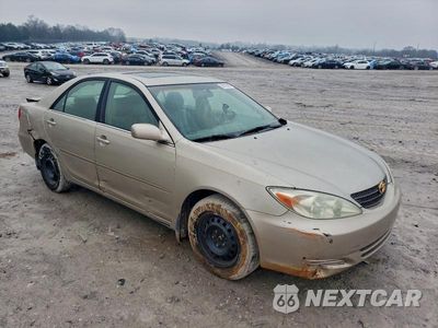Czwarte zdjęcie samochodu z boku: 2004 TOYOTA CAMRY LE VIN:4T1BE30K34U857713 - miniatura