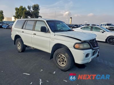 Czwarte zdjęcie samochodu z boku: 2000 MITSUBISHI MONTERO SPORT ES VIN:JA4LS21H0YP807705 - miniatura