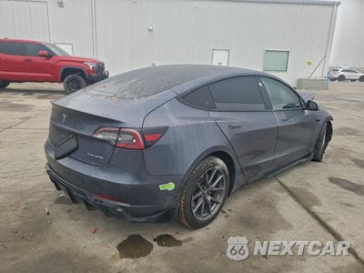 Trzecie zdjęcie samochodu z tyłu: 2023 TESLA MODEL 3 VIN:5YJ3E1EB6PF388975 - miniatura