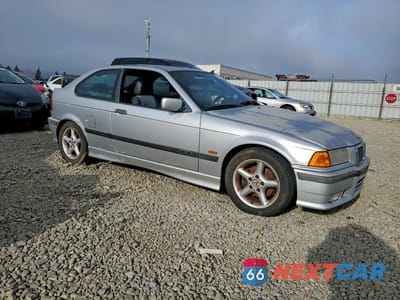 Czwarte zdjęcie samochodu z boku: 1999 BMW 318 TI AUTOMATIC VIN:WBACG8332XKC85439 - miniatura