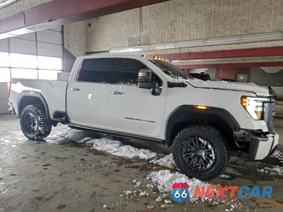 Czwarte zdjęcie samochodu z boku: 2024 GMC SIERRA K2500 DENALI ULTIMATE VIN:1GT49XEY9RF116581 - miniatura