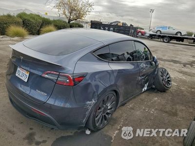 Trzecie zdjęcie samochodu z tyłu: 2022 TESLA MODEL Y VIN:7SAYGDEF5NF564967 - miniatura