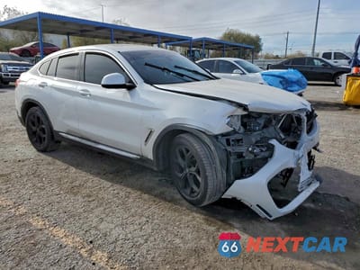 Czwarte zdjęcie samochodu z boku: 2021 BMW X4 XDRIVE30I VIN:5UX2V1C0XM9F38221 - miniatura