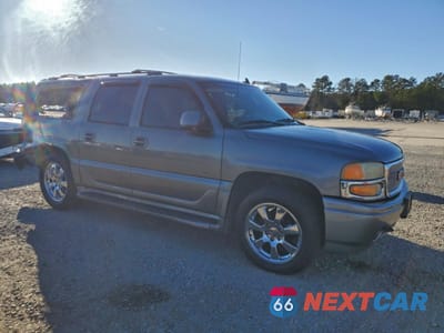 Czwarte zdjęcie samochodu z boku: 2006 GMC YUKON XL DENALI VIN:1GKFK66U26J125803 - miniatura