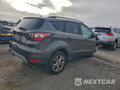 Trzecie zdjęcie samochodu z tyłu: 2017 FORD ESCAPE SE VIN:1FMCU9GD6HUC83342 - miniatura