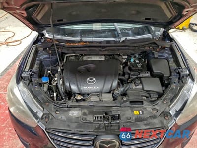 Zdjęcie 12 z 14 samochodu: 2016 MAZDA CX-5 GT VIN:JM3KE4DY3G0695058 - miniatura
