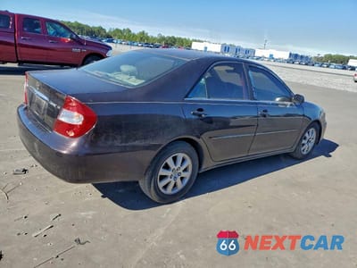 Trzecie zdjęcie samochodu z tyłu: 2002 TOYOTA CAMRY LE VIN:JTDBF30K720044946 - miniatura
