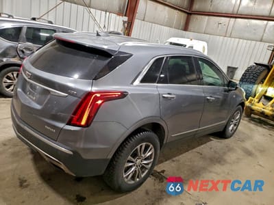 Trzecie zdjęcie samochodu z tyłu: 2022 CADILLAC XT5 PREMIUM LUXURY VIN:1GYKNDRS7NZ117030 - miniatura