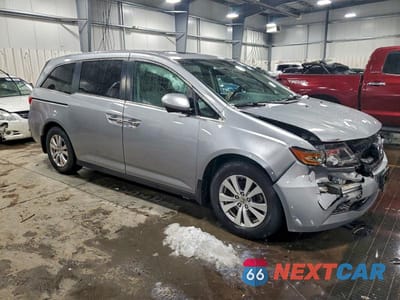 Czwarte zdjęcie samochodu z boku: 2016 HONDA ODYSSEY EXL VIN:5FNRL5H69GB101683 - miniatura