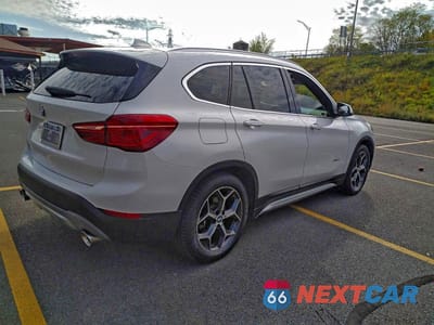 Czwarte zdjęcie samochodu z boku: 2016 BMW X1 XDRIVE28I VIN:WBXHT3C3XGP880243 - miniatura