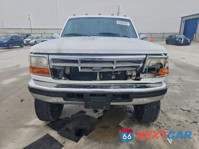 Piąte zdjęcie samochodu w środku: 1997 FORD F350 VIN:1FTJW36F3VEA37540 - miniatura