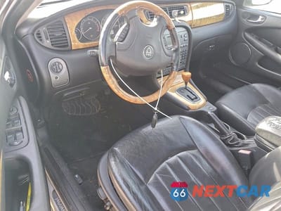 Zdjęcie 8 z 11 samochodu: 2014 JAGUAR F-TYPE VIN:SAJEA51C34WD67541 - miniatura
