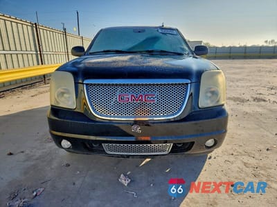 Piąte zdjęcie samochodu w środku: 2007 GMC YUKON DENALI VIN:1GKFK63857J299096 - miniatura