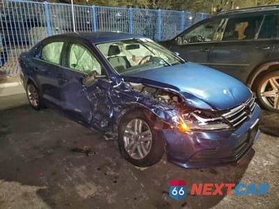 Czwarte zdjęcie samochodu z boku: 2017 VOLKSWAGEN JETTA S VIN:3VW2B7AJ1HM380006 - miniatura